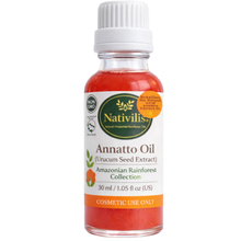 Load image into Gallery viewer, A 30 ml bottle of Nativilis Annatto Oil (Urucum Seed Extract) from the Amazonian Rainforest Collection, featuring a white cap and a white label with green and orange branding.